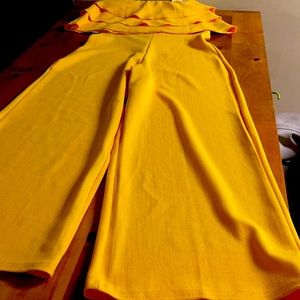 Woman two piece stretchy material pants set.